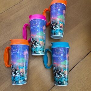 Disney Travel Mugs with pink Orange and Blue Lids